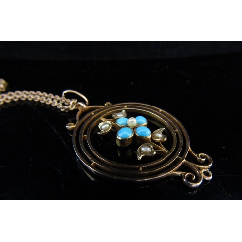 5073 - An Edwardian pendant of floral form stamped 8c hung on a metal chain, a gold chain stamped 9ct and a... 