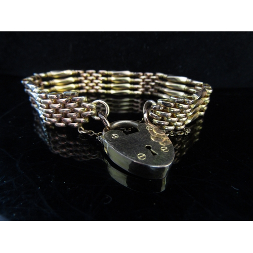 5077 - A rolled gold gate bracelet with padlock clasp   (R) £35