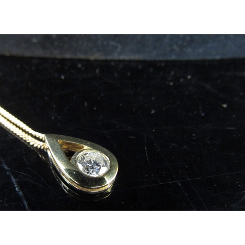 5078 - An 18ct gold pendant with a 0.50ct approx diamond, hung on an 18ct gold chain, 50cm long, 4g