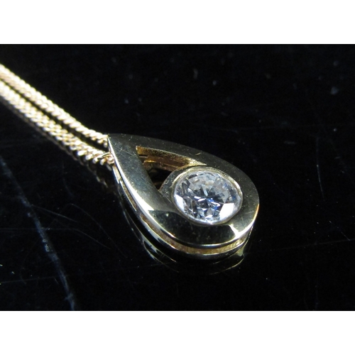 5078 - An 18ct gold pendant with a 0.50ct approx diamond, hung on an 18ct gold chain, 50cm long, 4g