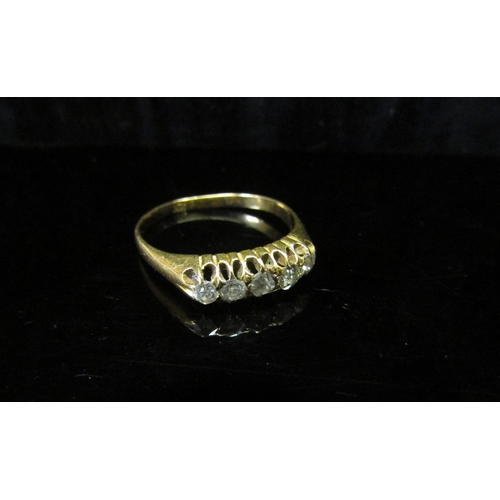 5118 - A gold ring set with five old cut graduated diamonds, unmarked. Size N, 2.5g   (C)