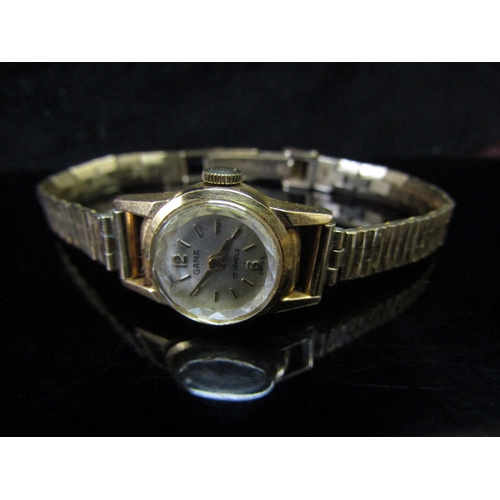 5152 - An 18ct gold cased Gama lady's wristwatch on 9ct gold strap, and a 14k gold cased Colomby lady's wri... 