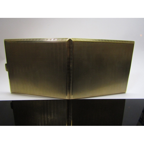 5159 - A 9ct gold cigarette case, engine turned detail, 128g