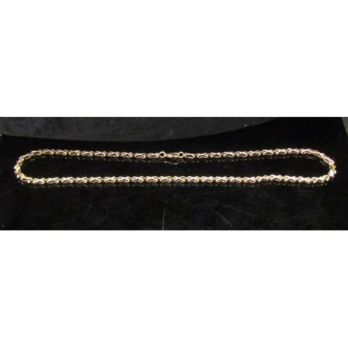 5161 - A 9ct gold fancy link necklace, 40cm long, 10.2g