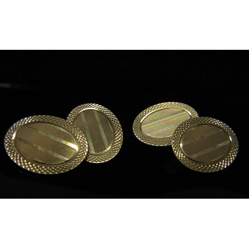 5166 - A pair of 18ct gold cufflinks, 10.4g