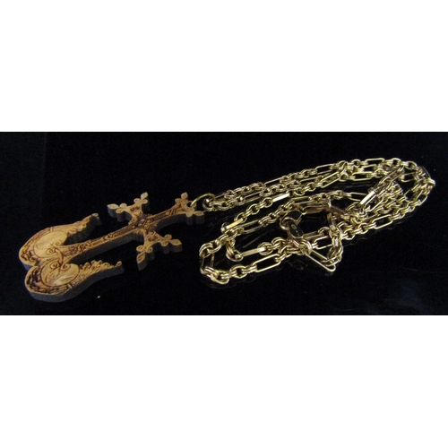 5170 - A 9ct gold necklace, 60cm long, 11.9g hung with a wooden winged cross pendant