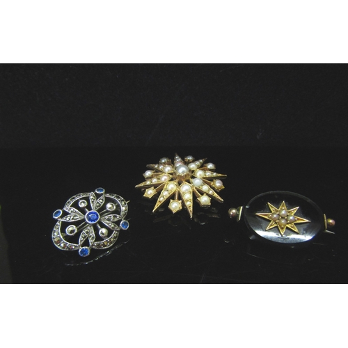 5177 - Three brooches including a seed pearl star brooch/pendant, unmarked, marcasite and blue glass stone,... 