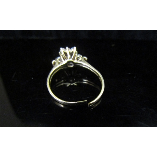 5124 - A gold diamond cluster ring, stamped 10ct, shank split, 2.4g  (C)