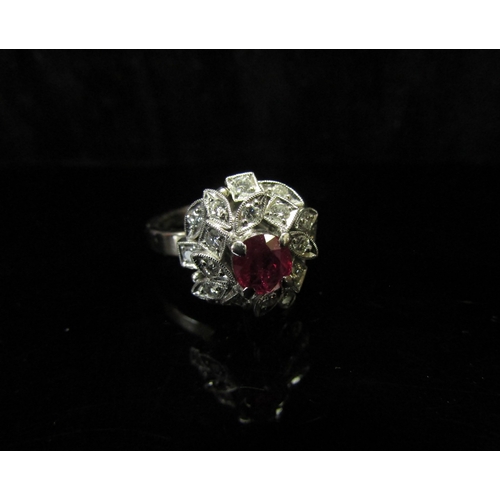 5126 - An Art Deco style ruby and diamond ring, stamped Pt.850. Size J, 6.5g  (C)