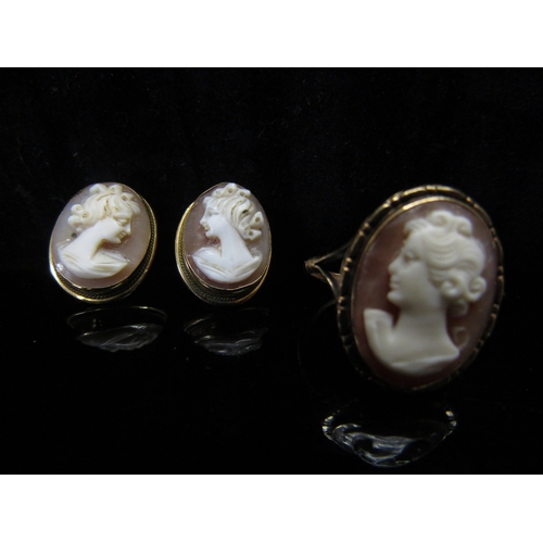 5127 - A gold cameo ring stamped 9ct. Size O, and a pair of cameo earrings, unmarked