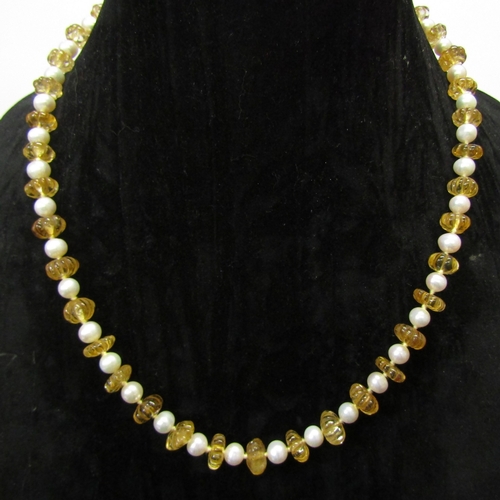 5129 - A carved citrine stone and cultured pearl necklace with gold clasp, 58cm long  (C)