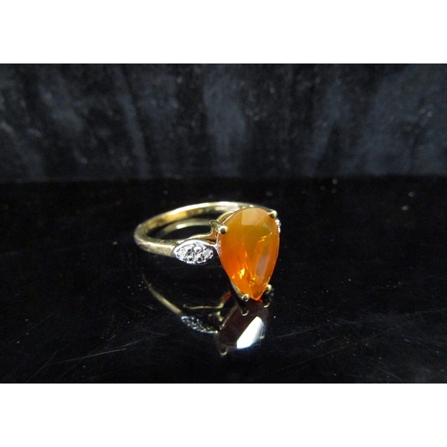 5133 - A 9ct gold fire opal and diamond ring.Size P/Q, 2.4g  (C)