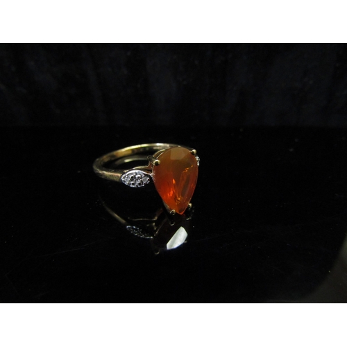 5133 - A 9ct gold fire opal and diamond ring.Size P/Q, 2.4g  (C)