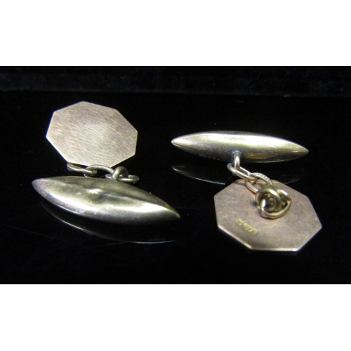 5144 - A pair of 9ct gold torpedo cufflinks, dented, 3.7g