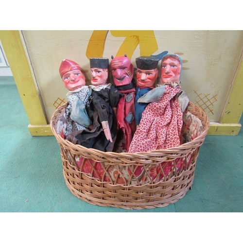 7097 - A wooden puppet theatre and five puppets