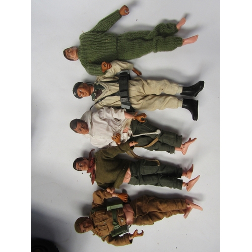 7134 - A collection of playworn 1970's Action Man figures, vehicles, clothing and accessories including Pal... 