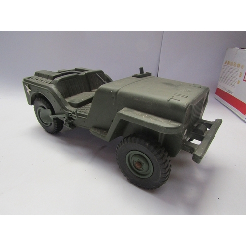 7134 - A collection of playworn 1970's Action Man figures, vehicles, clothing and accessories including Pal... 