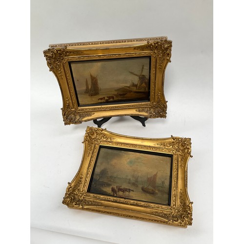 8043 - A pair of 19th Century oils on board depicting riverscapes, windmills and cattle grazing, oil bubble... 