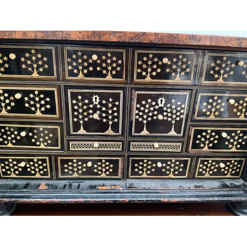 8022 - An 18th Century walnut collector's cabinet, the herringbone inlaid outer case with two doors opening... 