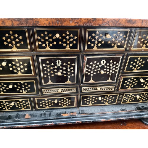 8022 - An 18th Century walnut collector's cabinet, the herringbone inlaid outer case with two doors opening... 