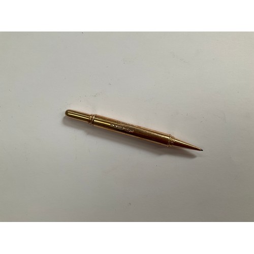 8086 - A 9ct gold propelling pencil, London A+C Ltd, 11.3g