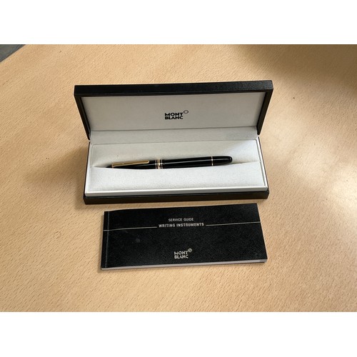 8129 - A Mont Blanc Classique fountain pen in black with gold detail, boxed with booklet