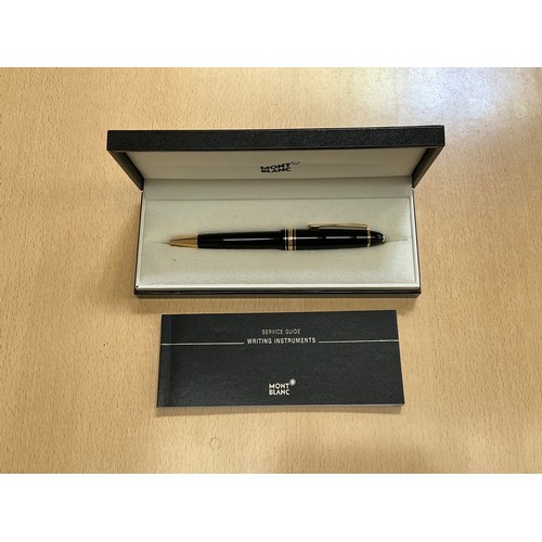 8130 - A Mont Blanc Classique ballpoint pen in black with gold detail, boxed with booklet