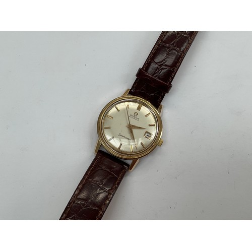 8131 - A 1960s Omega Seamaster Automatic gentleman’s wristwatch, 9ct gold cased, with leather strap