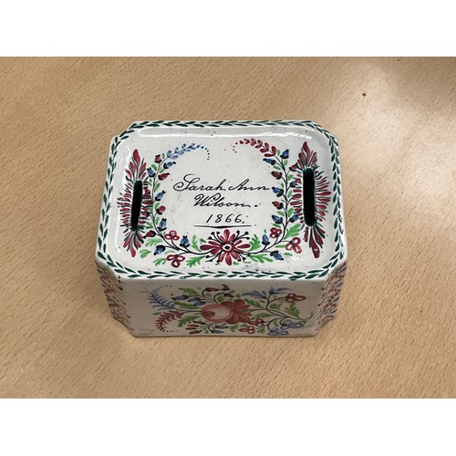 8135 - A Victorian ceramic money box, hand painted canted rectangular form, twin slots, Sarah Ann Wilson 18... 