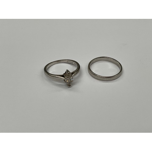 8158 - A platinum ring set with marquis cut diamond, approximately 0.40ct, size J/K, together with platinum... 