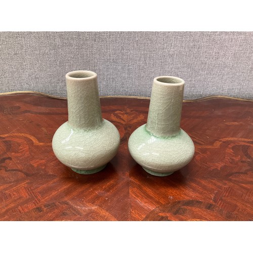 8171 - A pair of Chinese celadon glaze vases, bulbous form, 10.5cm tall