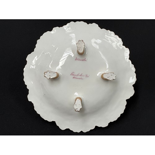 8293 - A Worcester Chamberlain and Co footed bowl, the central image depicting The Royal Porcelain Works Wo... 