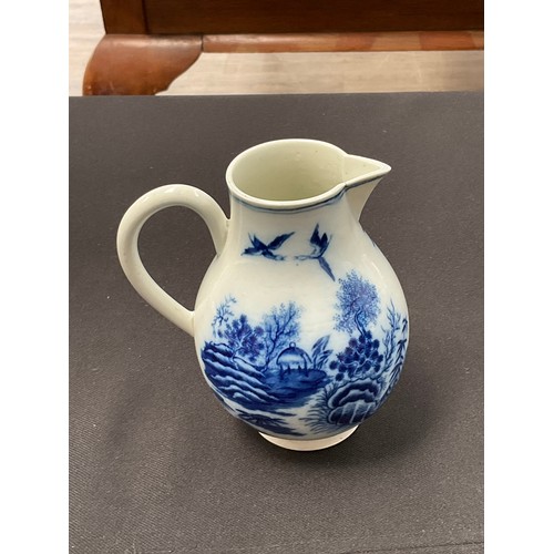 8296 - A Worcester blue and white sparrow beak jug with scenes of pagodas and flowers(hairline from side of... 