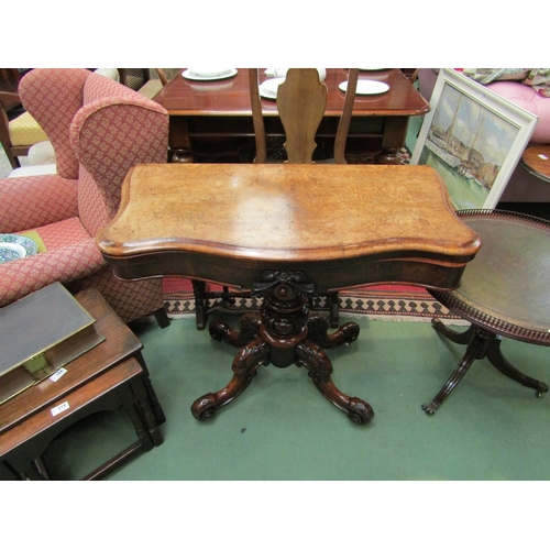 66 - An early Victorian circa 1850 burr walnut serpentine front hinged top card table on a carved and tur... 