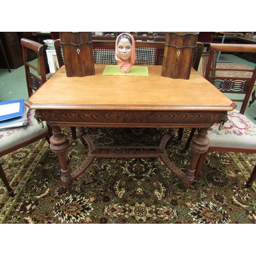 64 - A late Victorian oak table probably 