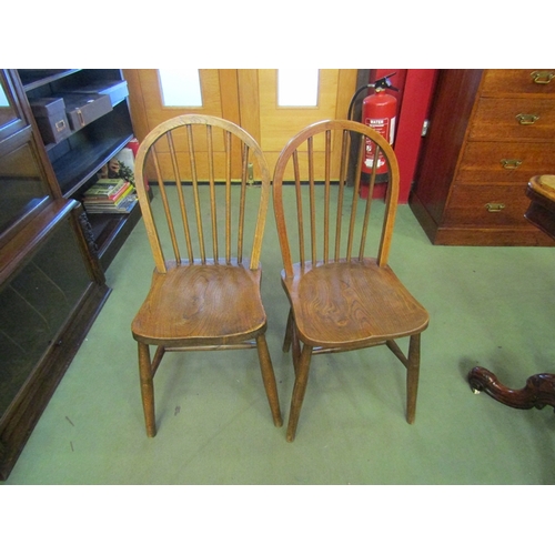 62 - Six elm seated spindle back chairs