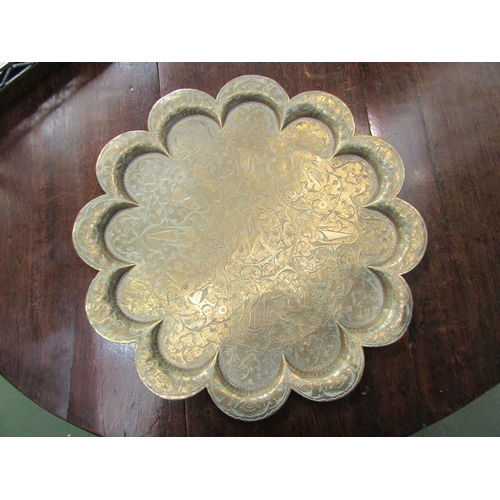 68 - A brass scalloped edge charger, 50cm diameter    (R) £0