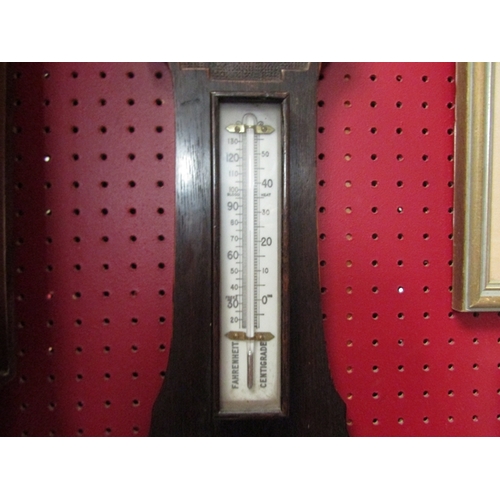 121 - An early 20th Century oak cased banjo barometer  76cm Length.