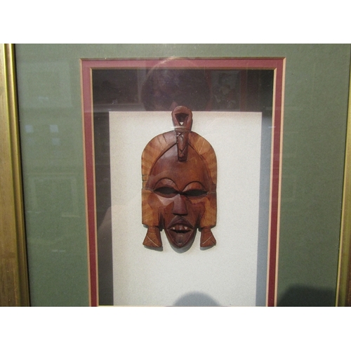 80 - An Art African mask in gilt frame