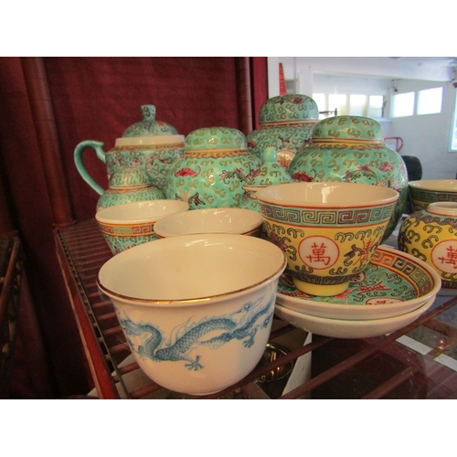 412 - A selection of Chinese turquoise wares including ginger jars, tea bowls, etc. and a pair of Chinese ... 