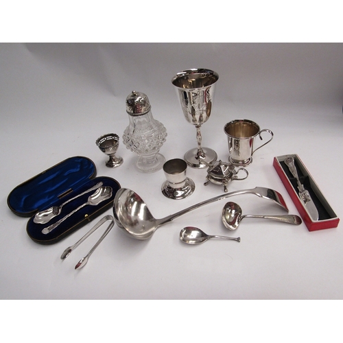 420 - A selection of silver and plated wares including a cased pair of silver preserve spoons, glass salt ... 