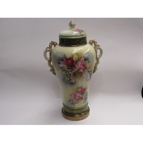 429 - An early 20th Century ceramic lidded urn with floral spray detail, 50cm tall        (E) £12-20