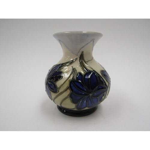 8058 - A Moorcroft Chilean Crocus pattern miniature vase, 9.5cm tall, boxed