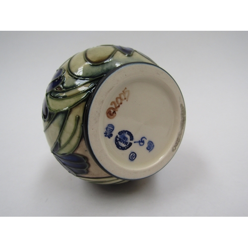 8058 - A Moorcroft Chilean Crocus pattern miniature vase, 9.5cm tall, boxed