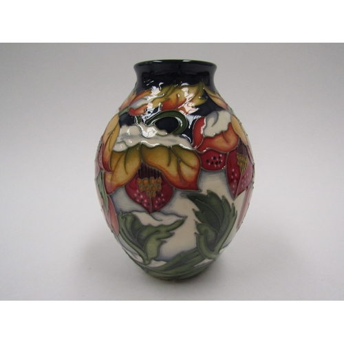 8065 - A Moorcroft Christmas Hellebore pattern vase by Rachel Bishop No.150, 14cm tall, boxed