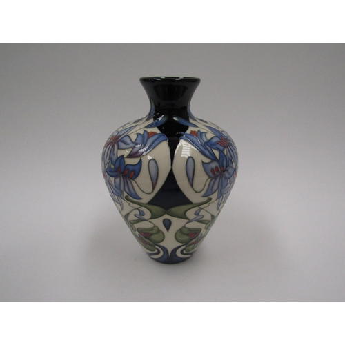 8070 - A Moorcroft Castle of Mey pattern vase, designed by Rachel Bishop, 18/200, 18cm tall, boxed