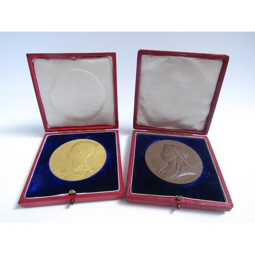 8083 - Two Queen Victorian diamond jubilee medalions 1837- 1897 in red leather cases, one gold and one bron... 