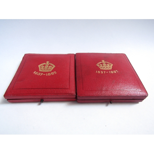 8083 - Two Queen Victorian diamond jubilee medalions 1837- 1897 in red leather cases, one gold and one bron... 