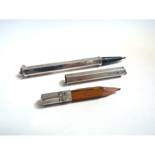 8092 - A silver pencil holder and silver propelling pencil