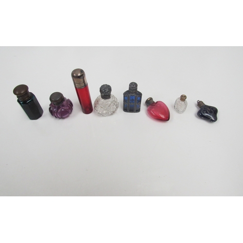 8183 - Eight small scent bottles, some with silver lids, heart shaped example etc. (8)